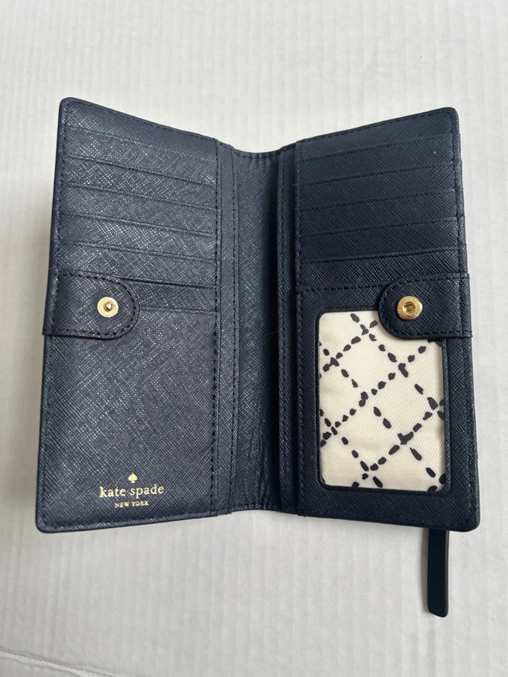 Kate Spade Newbury Lane Stacy Bifold Wallet In Navy Leather